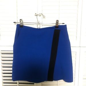 Blue skirt with black asymmetrical fold